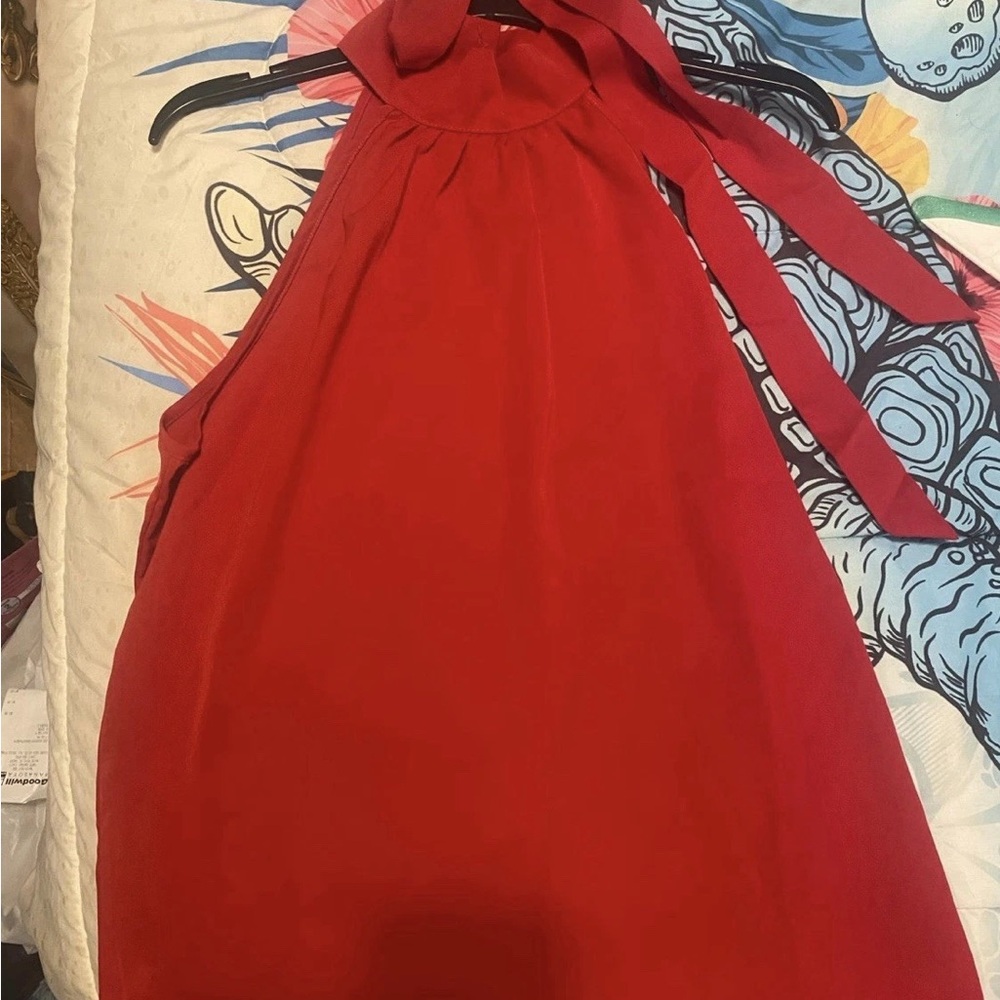 Elegant Red Halter Top with ribbon bow accent around the neck